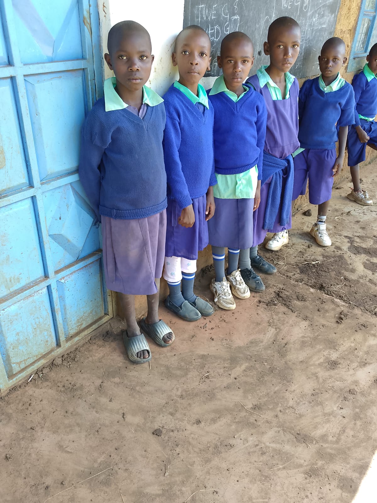 Children's hands joined together in unity